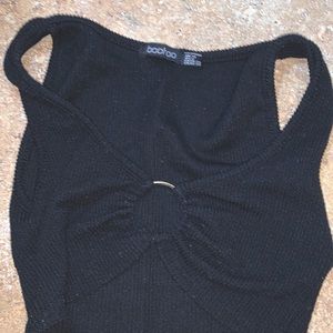 It is a crop top very cropped it is very fuzzy